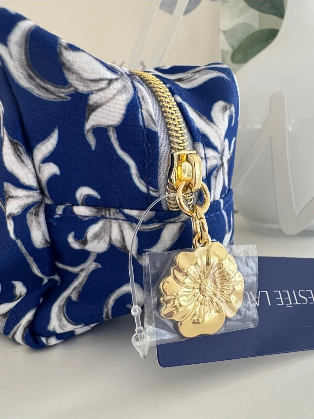 Estee Lauder Navy Blue & White Floral Cosmetic Pouch with Gold Zipper